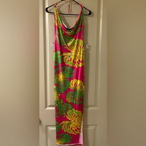 Low back bilateral high slit maxi dress that ties around the neck.